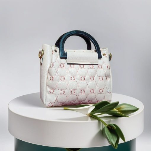 Chic Cream Handbag with Black Handle & Stylish Strap